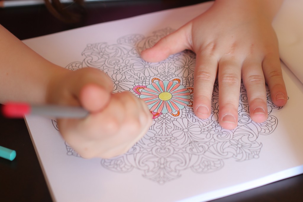 I'm amazed at how well her tiny little hands can handle the intricate designs in these books!