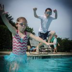 Now in this picture, they were running and jumping off the edge of the pool into the water. Not a bad shot for a pocket camera. And...it would've been even better if I'd put it in Sports Mode, but I did not have my glasses with me, so I couldn't switch it. Maybe next time...