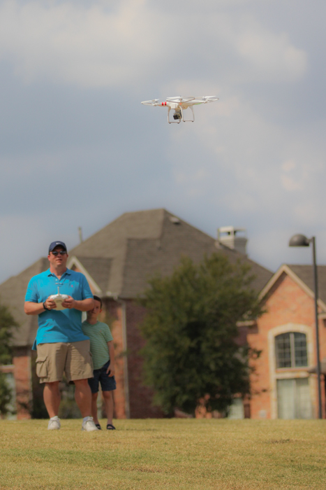Whenever Mark is out flying his drone, Zach is always close by. Patiently waiting for his turn to fly it!