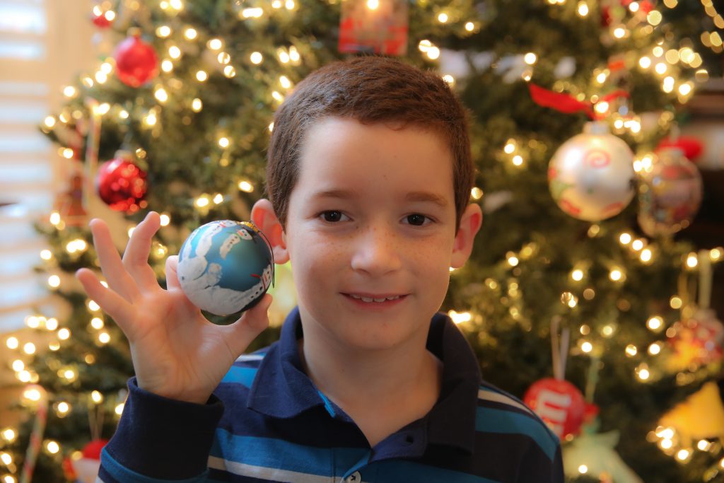 Perfect example - Zach made this hand print ornament in preschool! So...when we hang this one, we talk all about his preschool teachers, etc... So many memories!